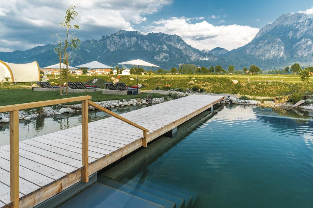 The Hotel Das Rübezahl in the Allgäu region has a natural swimming pond.