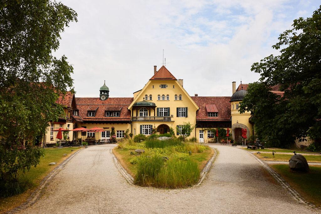 This is an exterior view of the Gut Sonnenhausen sustainable hotel in Bavaria.