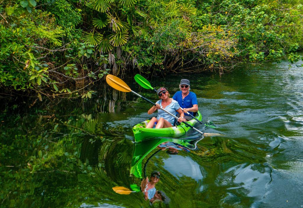 Canoeing on the river in Cambodia - Eco-friendly vacation