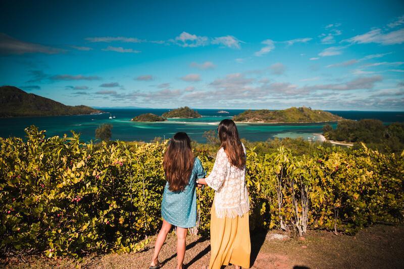 Women enjoy the view of the ocean. © Cerf Island Resort