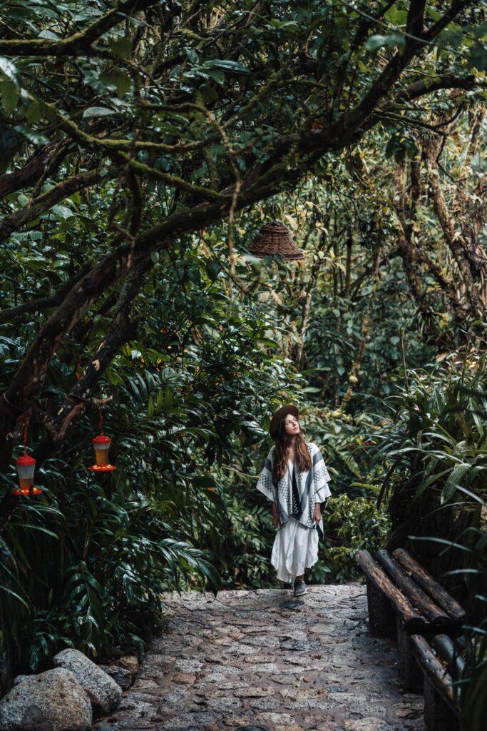 Young woman gazes into the tropical forest in Peru