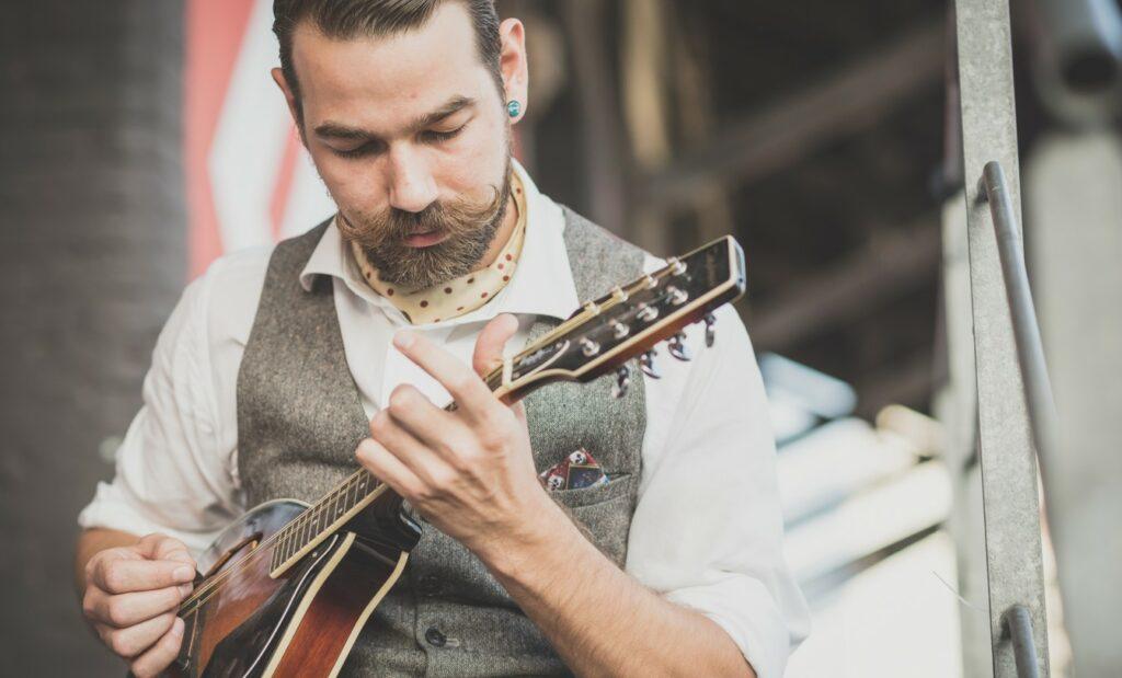 A musician playing the mandolin