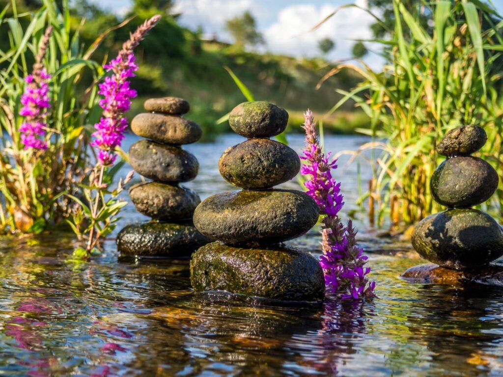 Meditatively piled stones in the river. A symbol for TCM