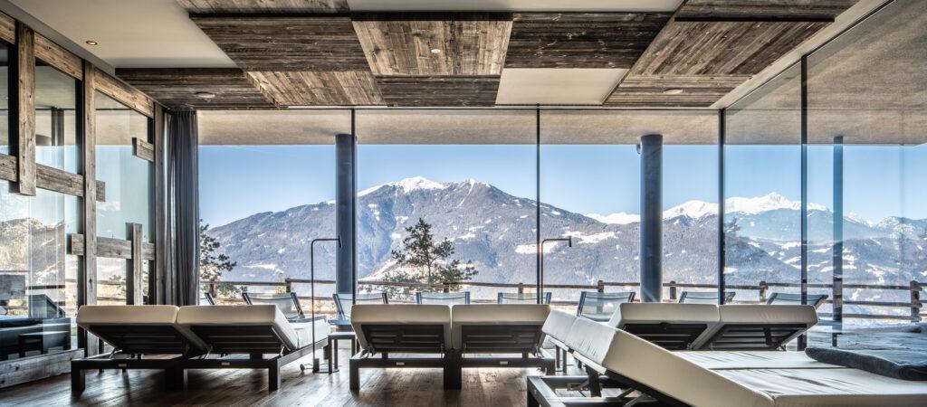Relax in the relaxation room with mountain views. Plose, near Brixen, South Tyrol — sustainable vacation.
