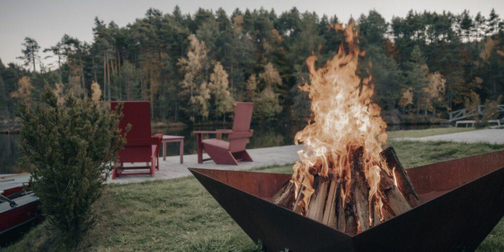 Fire bowl in sustainable hotels View of Wolfsgruben Lake