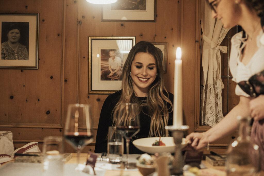 A sustainable hotel restaurant with candlelight.