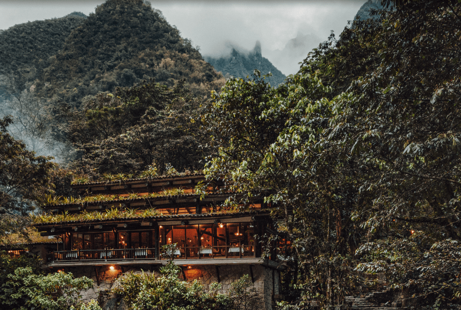 The Amazon rainforest and the Inkaterra Reserva Amazonica hotel in the mist.