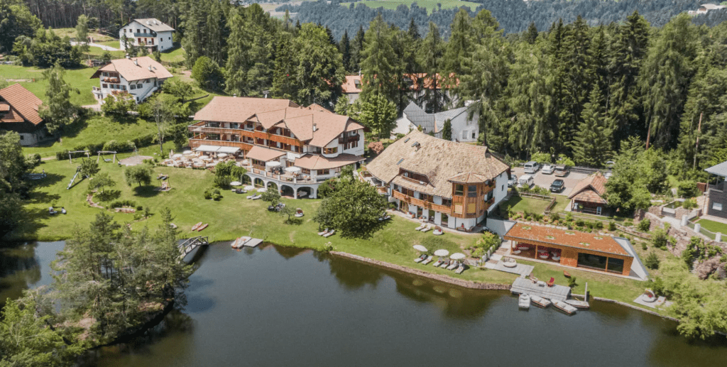 Aerial view of the Hotel Weihrerhof on the Wolfsgruben Lake in South Tyrol