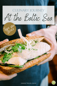 Close-up of a sandwich held by two hands, filled with white fish, lettuce, and herbs. Text overlay reads, "Culinary Journey at the Baltic Sea."