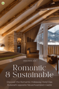 Cozy hotel room at romantic Hotel Das Rübezahlwith wooden beams, stone wall, and a large window revealing snowy mountains. Text reads "Romantic & Sustainable" with travel blog info.