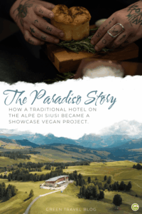Hands with tattoos hold a loaf atop rosemary sprigs, above the Alpine hotel Paradiso Pure.Living Vegan Hotel in the Dolomites. Text: "The Paradiso Story," about a vegan hotel project.